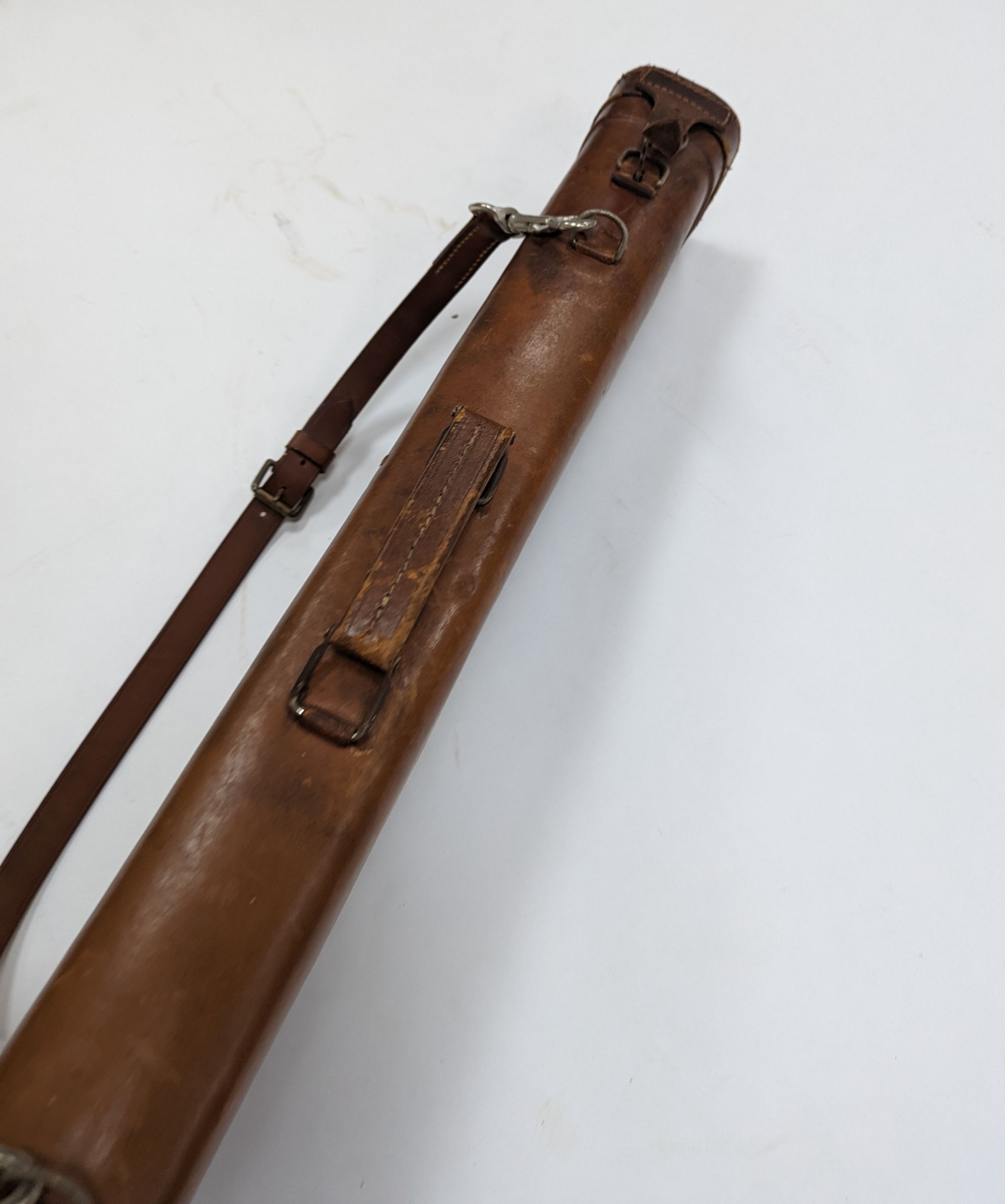 A leg of mutton shaped leather gun case